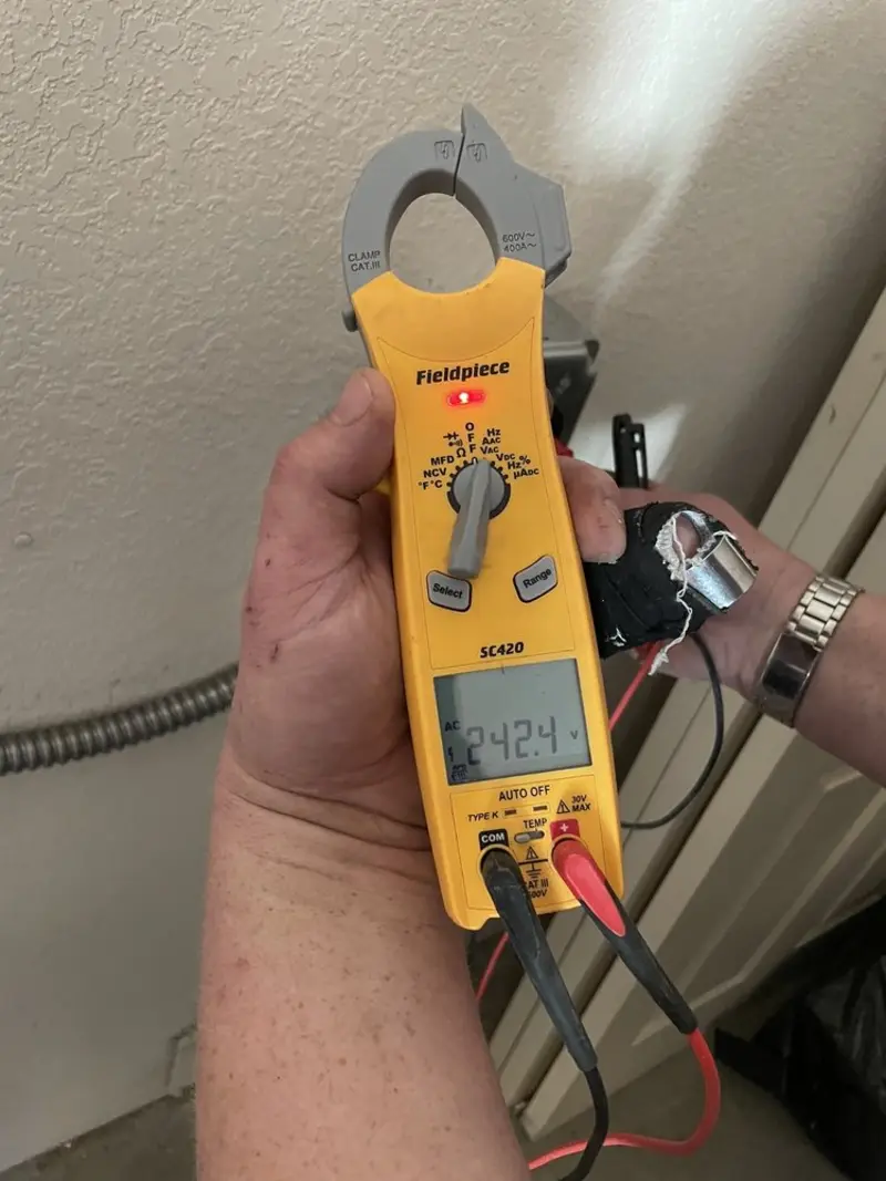 Voltage testing with clamp meter during Aluminum Wiring Replacement in Waukegan